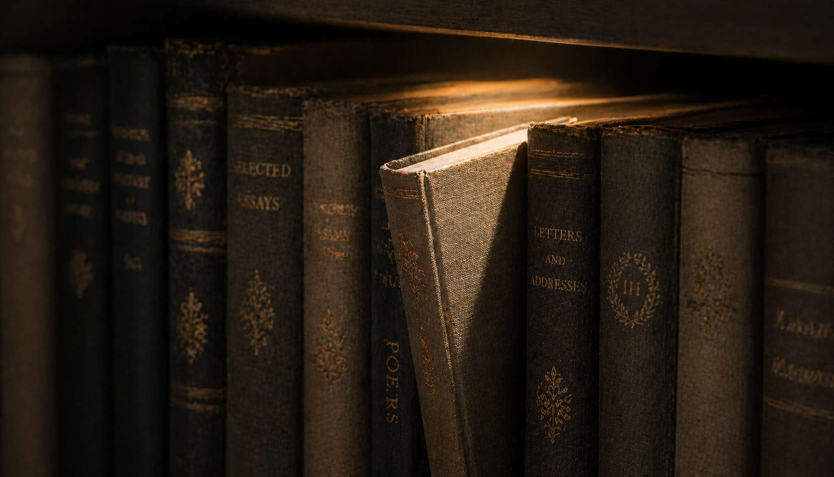A book spine cracked open just enough to mark a returning reader's place